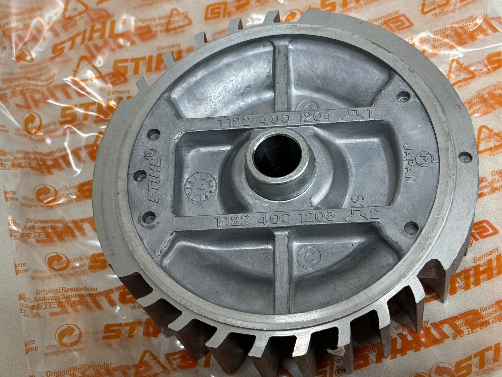 STIHL OEM 1122 400 1203 FLYWHEEL FOR 064 064R , DUAL KEYWAY